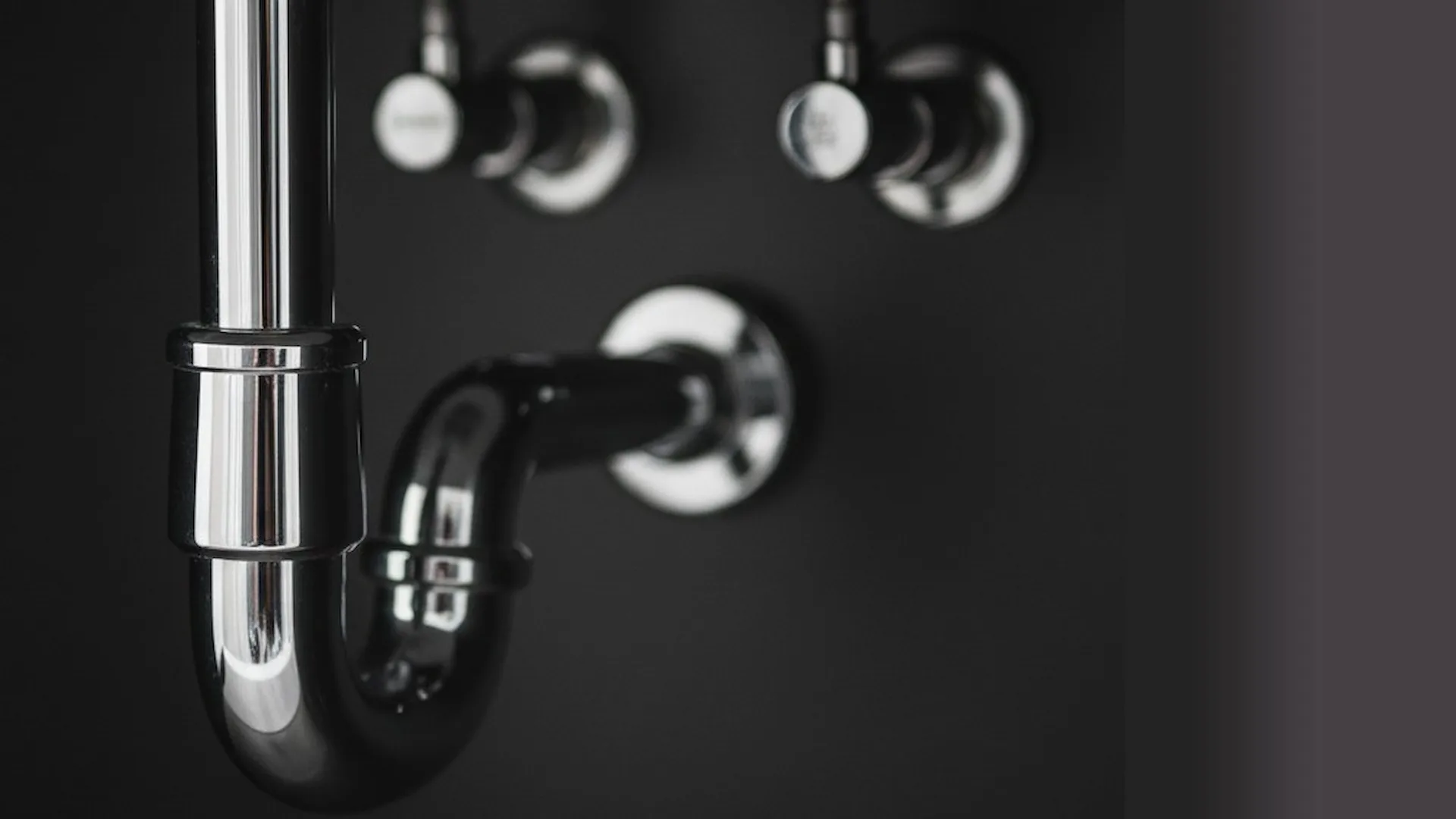 Clean chrome pipes under a sink